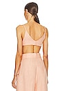 view 3 of 4 Triangle Tie Front Crop Top in Peach