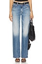 view 1 of 6 The Mid Rise Tunnel Vision Sneak Jeans in I'm A Winner