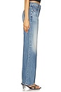 view 3 of 6 The Mid Rise Tunnel Vision Sneak Jeans in I'm A Winner