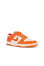 view 2 of 6 Nike Dunk Low Retro Sneakers in Pale Ivory & Safety Orange