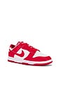 view 2 of 6 Nike Dunk Low Retro Sneakers in White, University Red, & White