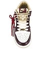view 4 of 7 Dunk Low LX Sneaker in Sail, Team Gold, & Burgundy Crush