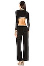 view 3 of 4 Stud Long Sleeve Cut Out Jumpsuit in Black