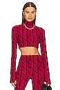 view 1 of 4 Slimm Fit Turtleneck Cropped Top in Red Cable
