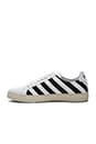 view 5 of 6 Diagonal Stripe Sneakers in White & Black