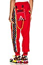 view 1 of 6 x Jahnkoy Pants in High Risk Red