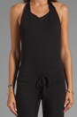 view 5 of 5 REVOLVE Exclusive Nadja Halter Boot Cut Jumpsuit in Black