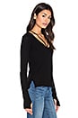 view 2 of 5 Strappy V Neck Sweater in Black