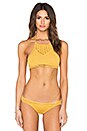 view 1 of 4 Crochet Halter Bikini Top in Marigold