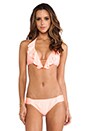view 1 of 4 Coral Solid Ruffle Bikini Top in Coral