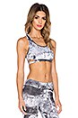 view 2 of 4 Cut Out Racerback Sports Bra in Abstract Print