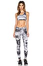 view 4 of 4 Cut Out Racerback Sports Bra in Abstract Print