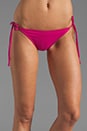 view 1 of 3 Tis String Bikini Bottom in Fuchsia
