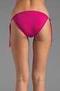 view 2 of 3 Tis String Bikini Bottom in Fuchsia