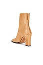 view 4 of 5 Asymmetric Cap Toe Ankle Boot in Sand