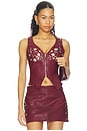 view 1 of 5 Concho Leather Top in Maroon Banner