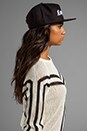 view 2 of 3 .COM Cap in Black