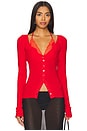 view 1 of 4 Ribbed Jersey Cardigan With Bra Top in Perriand Red