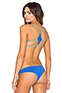 view 1 of 6 Ellie Reversible Halter Bikini Top in Royal Blue & Turquoise