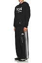 view 5 of 6 Yohji Yamamoto x NBHD Track Pants in Black