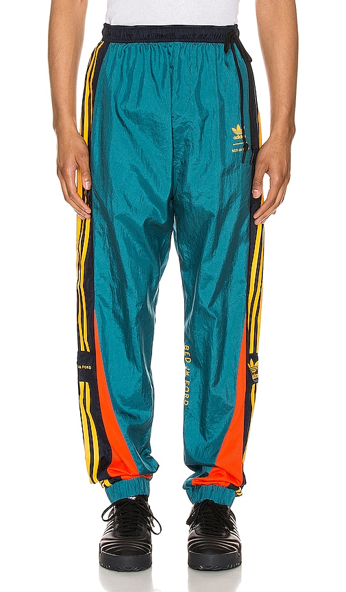 teal adidas track pants