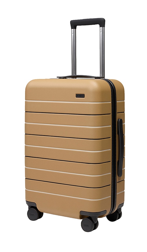 Away The Carry-On Suitcase in Tan.