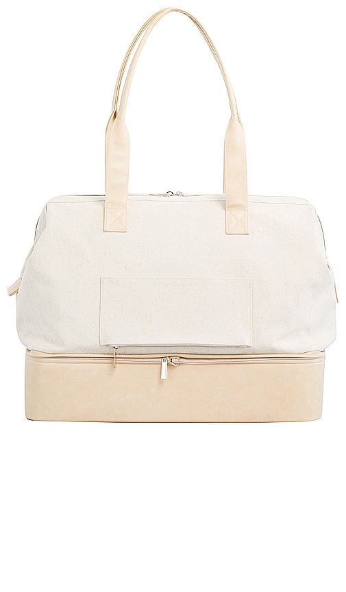 Shop Beis The Convertible Weekend Bag In 米色