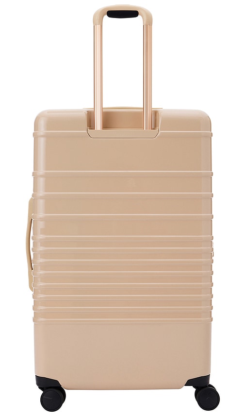 Shop Beis The Glossy Large Check-in Roller In Beige