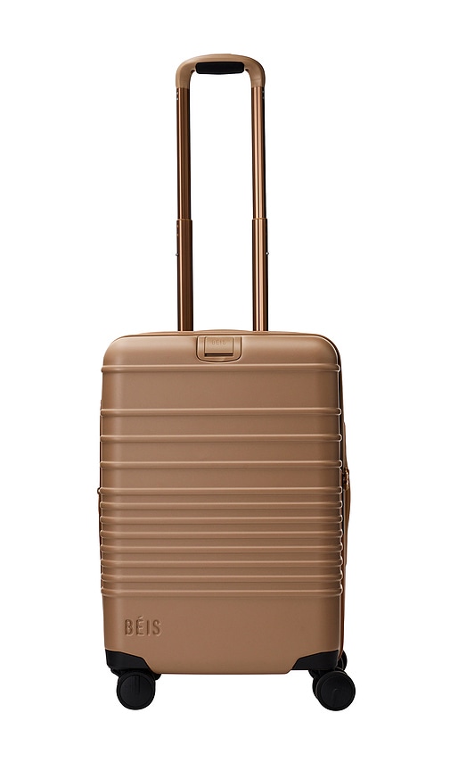The Carry-on Roller Luggage in Tan.