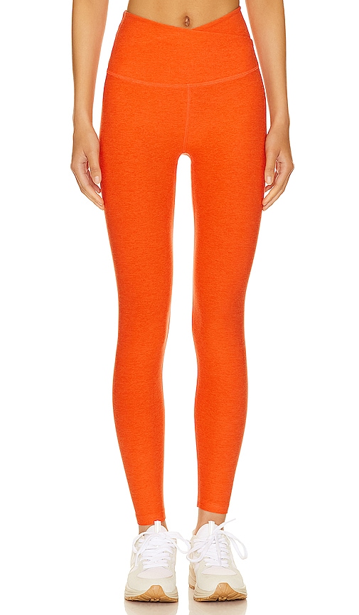 Beyond Yoga Spacedye At Your Leisure High Waisted Midi Legging in Orange.