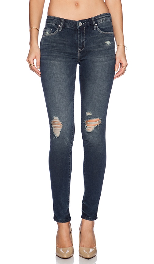 JEANS AJUSTADOS DESGASTADOS