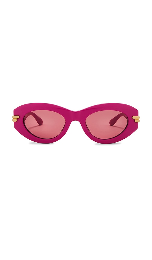 Shop Bottega Veneta Oval Sunglasses In Fuchsia & Red