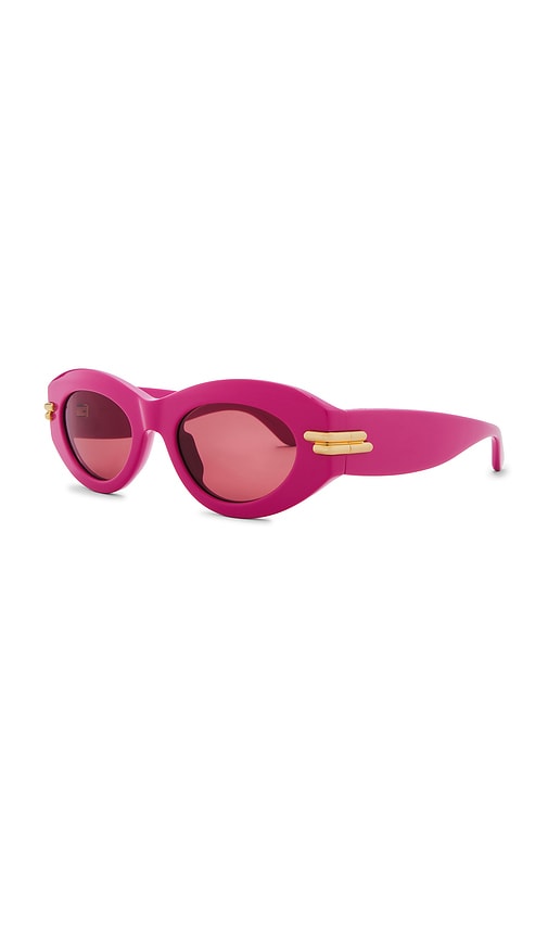 Shop Bottega Veneta Oval Sunglasses In Fuchsia & Red