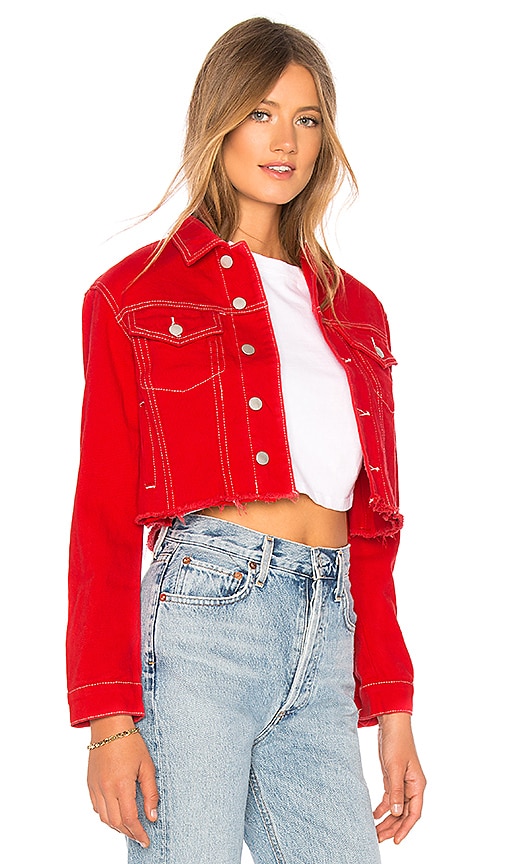 red denim jacket with white stitching