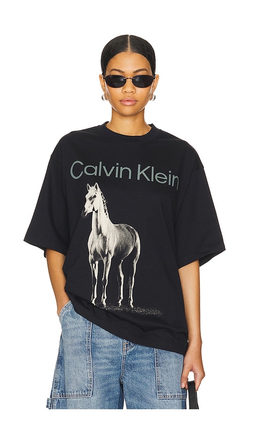 Calvin Klein Dark Horse T Shirt in Black Beauty REVOLVE