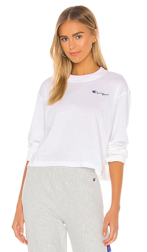 Champion Cropped Long Sleeve Tee in White | REVOLVE