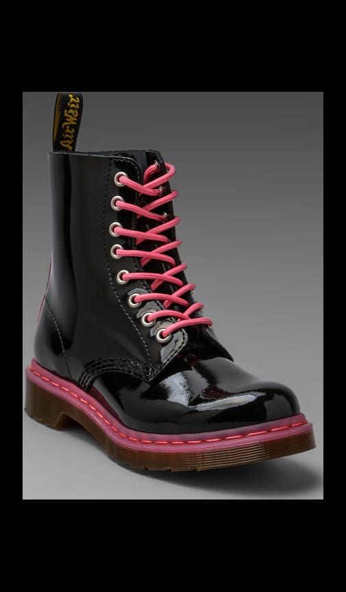 pink and black doc martens