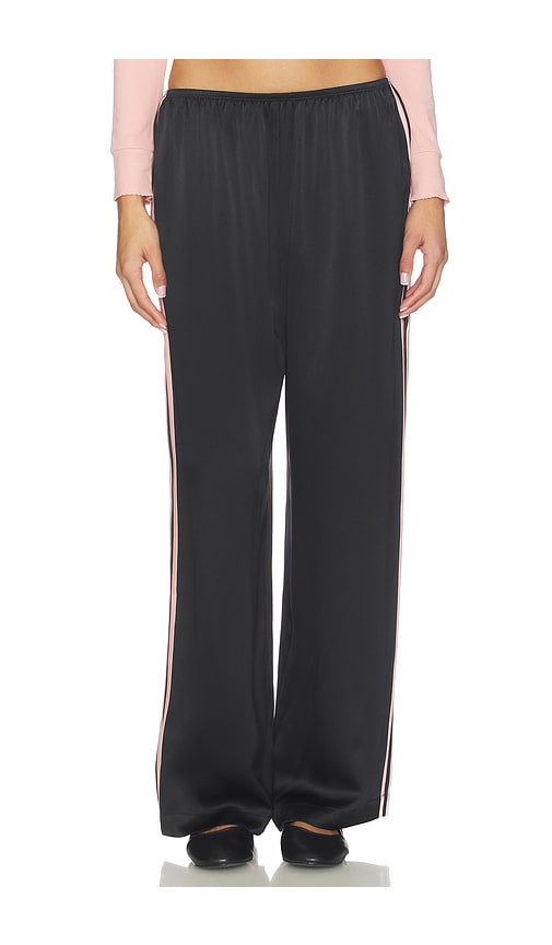 DONNI. The Silk Stripe Simple Pant - back view in Black