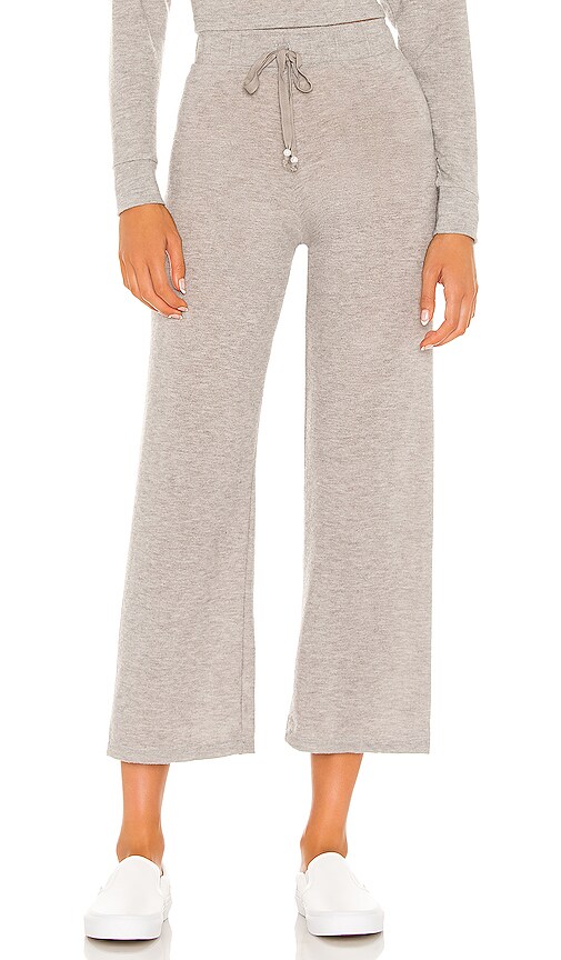 DONNI. Sweater Cropped Flare Sweatpant in Heather REVOLVE