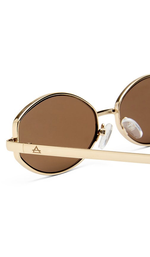  Aire Objective Sunglasses In Metallic Gold. 