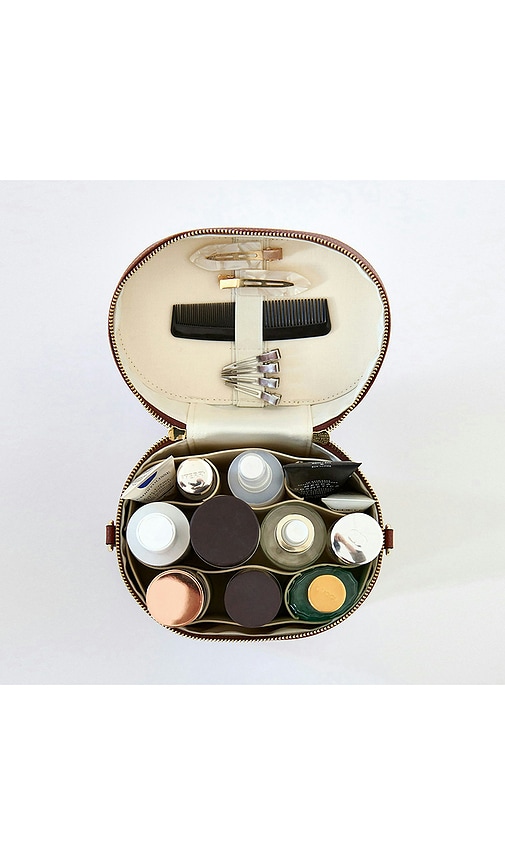  Etoile Collective Oval Toiletry Case In Brown. 
