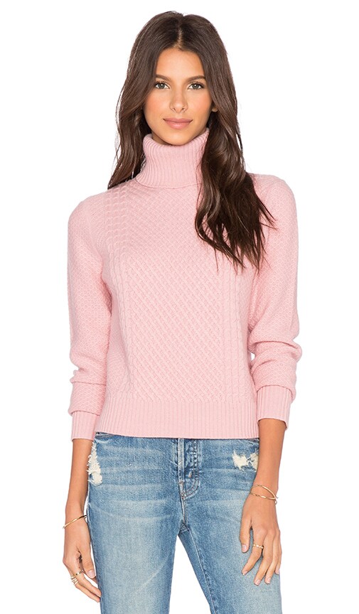 pink turtleneck sweater