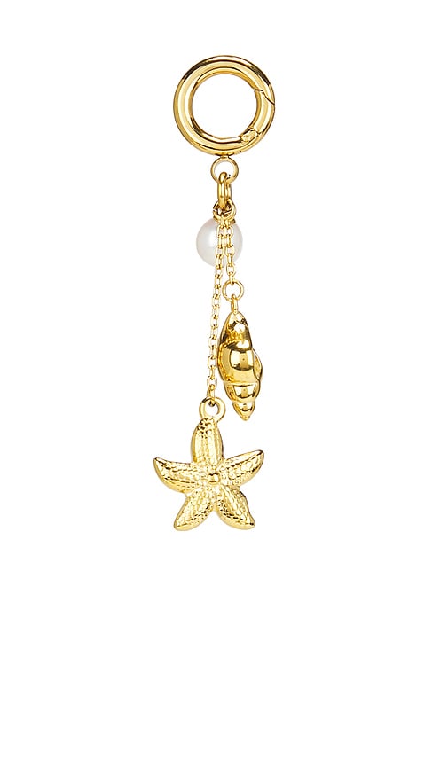 X Kopari Charm in Metallic Gold.