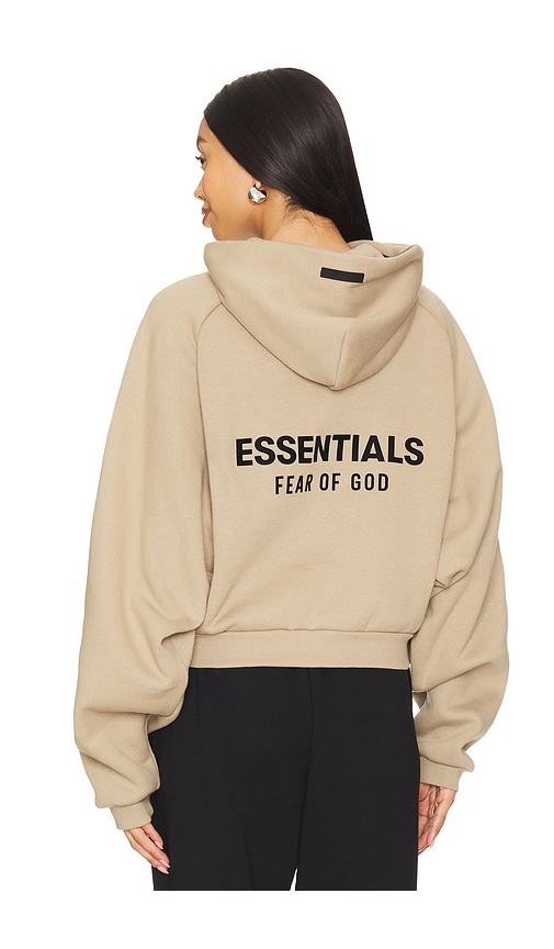 Fear of God ESSENTIALS Cropped Hoodie in Desert Sand | REVOLVE