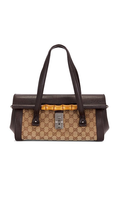FWRD Renew Gucci Bamboo Bullet Handbag in Brown.