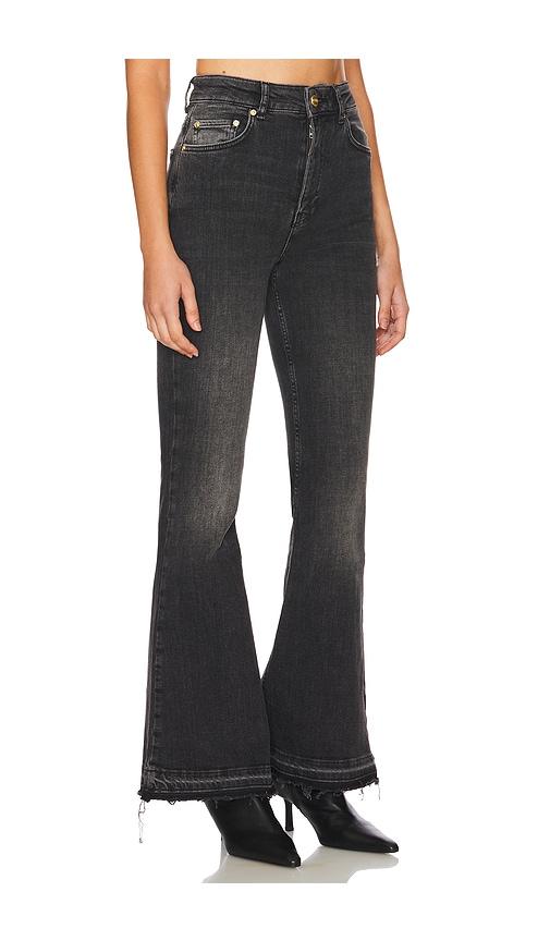 Shop Ganni Denim Flare Jeans In Washed Black & Black