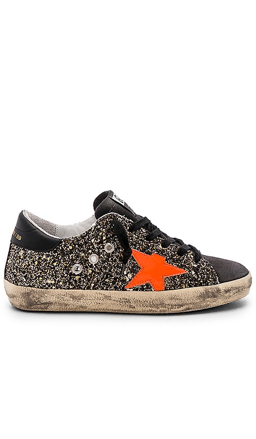 black and gold golden goose sneakers