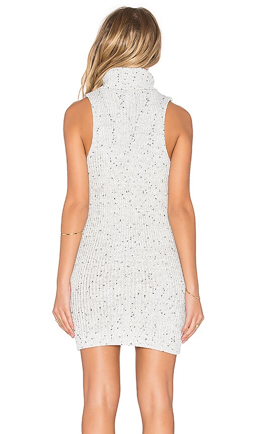 white sleeveless turtleneck dress