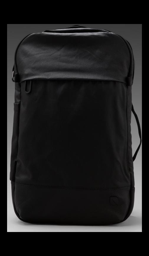 incase leather and canvas backpack