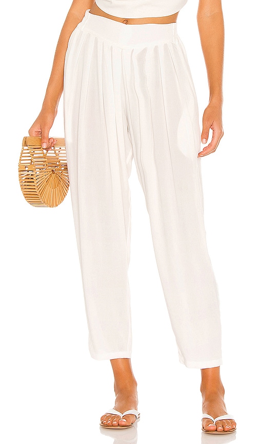 Indah Tanah Solid 80s Pleated Trouser in Ivory | REVOLVE
